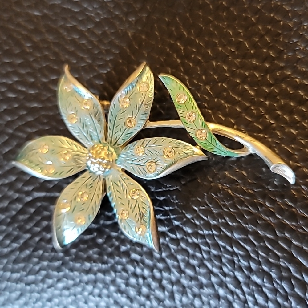 J.J. brooch